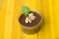 Fresh chocolate mousse with walnut and mint. Royalty Free Stock Photo