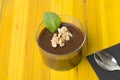 Fresh chocolate mousse with walnut and mint. Royalty Free Stock Photo