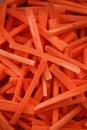 Fresh chopped carrots close-up background