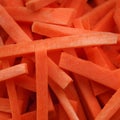 Fresh chopped carrots close-up background Royalty Free Stock Photo