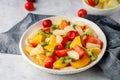 Fresh chopped fruit salad in a bowl