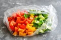 Fresh chopped salad vegetable in plastic food bag