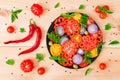 Fresh chopped tomatoes on a plate on a wooden table Royalty Free Stock Photo