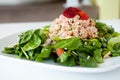 Fresh chopped tuna salad topped with strawberries