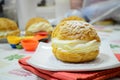 Fresh choux cream pastry on white dish Royalty Free Stock Photo