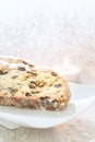Fresh Christmas Stollen on a white plate. Royalty Free Stock Photo