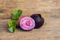 Fresh Chrysophyllum cainito fruits on wood background