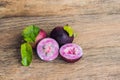 Fresh Chrysophyllum cainito fruits on wood background