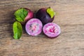 Fresh Chrysophyllum cainito fruits on wood background