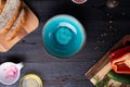 Fresh ciabatta bread  with blue bowl and ingredients served at dark wooden table. meditarranean cuisine. flat lay Royalty Free Stock Photo