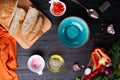 Fresh ciabatta bread  with blue bowl and ingredients served at dark wooden table. meditarranean cuisine. flat lay Royalty Free Stock Photo