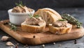 Fresh ciabatta bread with pate on wooden board. Tasty food. Delicious Italian bakery Royalty Free Stock Photo