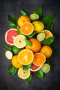 Fresh citrus fruit assortment on black. Royalty Free Stock Photo