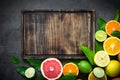 Fresh citrus fruit assortment on black. Royalty Free Stock Photo