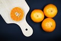 Fresh citrus fruit with wooden tray