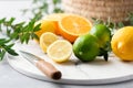 Fresh citrus fruits on marble board Royalty Free Stock Photo