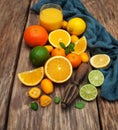 Fresh citrus fruits and old juicer Royalty Free Stock Photo