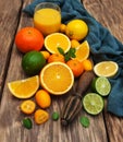 Fresh citrus fruits and old juicer Royalty Free Stock Photo