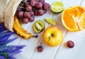 Fresh citrus fruits on a old wooden table. Royalty Free Stock Photo