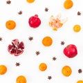 Fresh citrus, garnet and anise on white background. New year concept. Flat lay. Top view