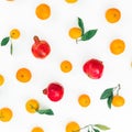 Fresh citrus and garnet isolated on white background. Flat lay. Top view