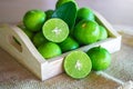 Fresh Citrus lime fruit in wooden box Royalty Free Stock Photo