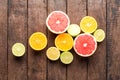 Fresh citruses on wooden background Royalty Free Stock Photo