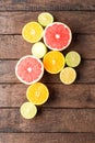 Fresh citruses on wooden table Royalty Free Stock Photo