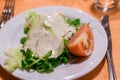 Fresh classic caesar salad on dining table