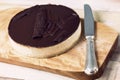 Fresh classic homemade Cheesecake with dark chocolate topping