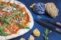 Fresh classic italian pizza with pasta and Cutlery, top view, flat lay Royalty Free Stock Photo