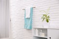 Fresh towels on hanger in bathroom Royalty Free Stock Photo