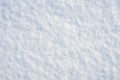 Fresh clean white snow background texture. Winter background with frozen snowflakes. Royalty Free Stock Photo