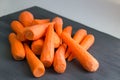 Fresh cleared yellow orange red carrot vegetables prepared for cooking healthy organic vegan food recipe