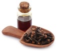 Fresh clove with oil in a jar Royalty Free Stock Photo