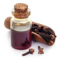 Fresh clove with oil in a jar Royalty Free Stock Photo