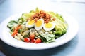 fresh cobb salad on white plate, blue cheese crumbs on top Royalty Free Stock Photo