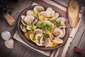 Fresh Cockle clams (Venus, Meretrix) with wine sauce. Portuguese