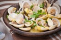 Fresh Cockle clams (Venus, Meretrix) with wine sauce. Portuguese