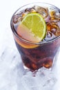 Fresh cocktail with cola drink and lime Royalty Free Stock Photo