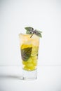 Fresh cocktail with grape, lime and basil leaves Royalty Free Stock Photo