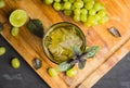 Fresh cocktail with grape, lime and basil leaves Royalty Free Stock Photo