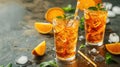 Iced tea with orange slices in tall glasses. Summer refreshment and beverage concept with space for text for banner, menu design