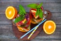 Fresh cocktail with orange, mint and ice, selective focus Royalty Free Stock Photo