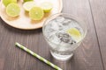 Fresh cocktail with soda, lime on a wooden background Royalty Free Stock Photo