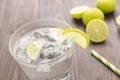 Fresh cocktail with soda, lime on a wooden background Royalty Free Stock Photo