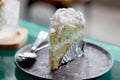 Fresh coconut cake on plate in restaurant