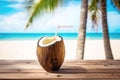 Fresh coconut coctail on the beach in beautiful lagoon