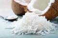 Fresh coconut flakes on a blue background Royalty Free Stock Photo
