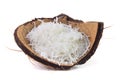 Fresh coconut flakes placed in bark and shell  on white background Royalty Free Stock Photo